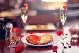 Ко Дню влюбленных клиника "ИмплаДент" дарит сертификат на романтический ужин для двоих